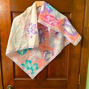 Pre-loved Polyester floral scarf with pretty pastel colors. Unbranded.